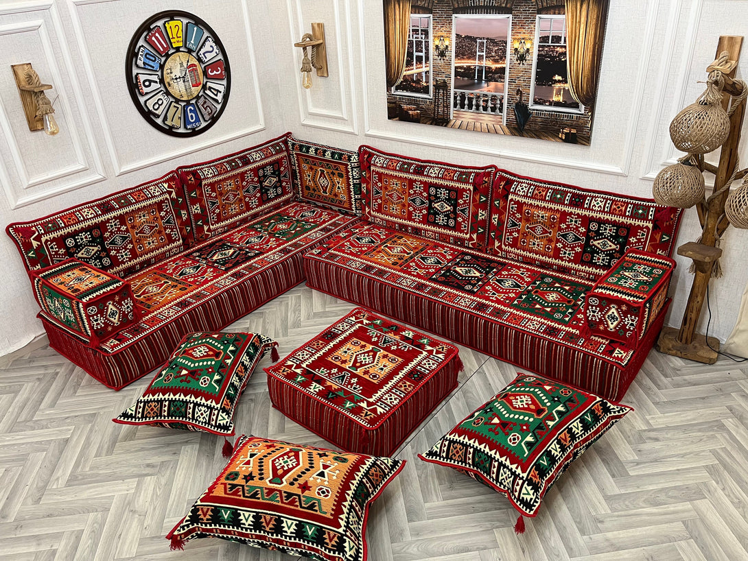 Cozy 8 inch L Shaped Arabic Majlis sofa set with red ethnic cushions, perfect for an inviting living room atmosphere.