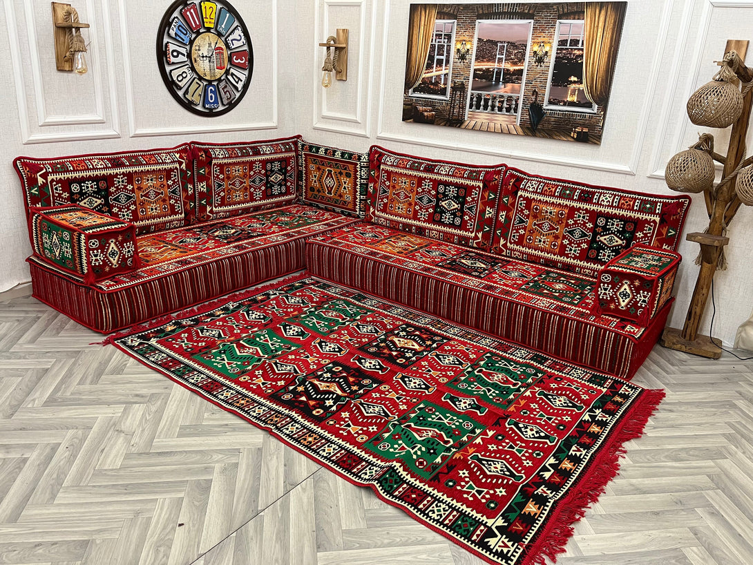 8 inch L Shaped Arabic Sofa Set with ethnic patterns and red floor cushion, creating a cozy Arabic Majlis style seating.